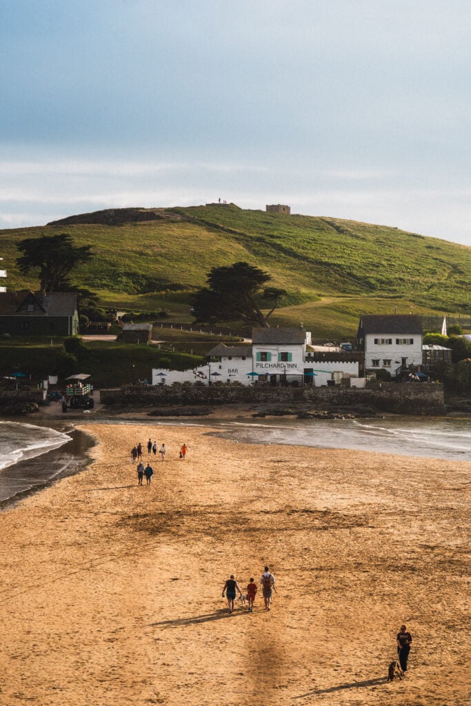 view of bigbury on sea beach with burgh island in the distance