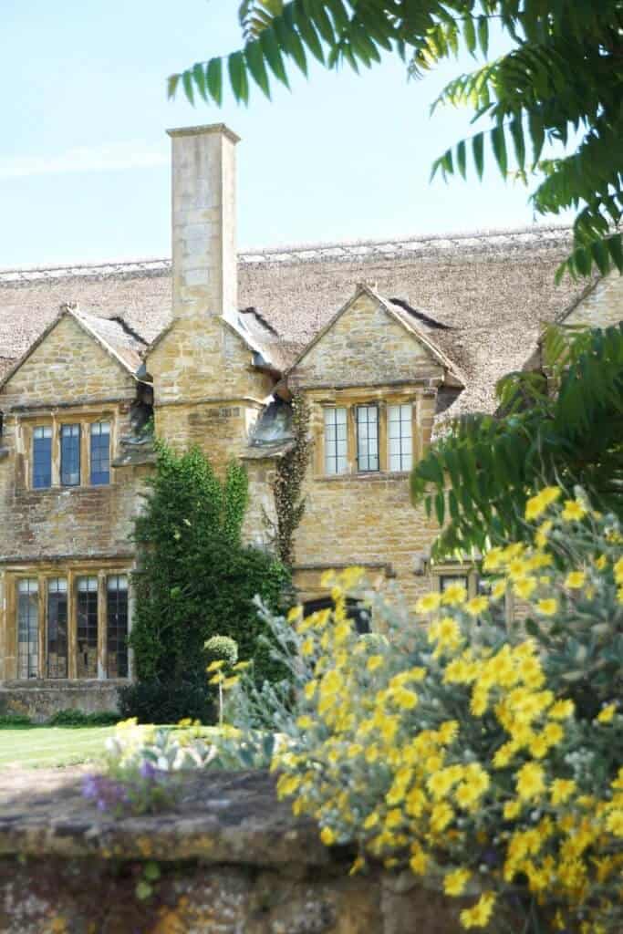 Lovely Flowers framing a stone house Hinton St George, Somerset, England (things to see, do and visit)