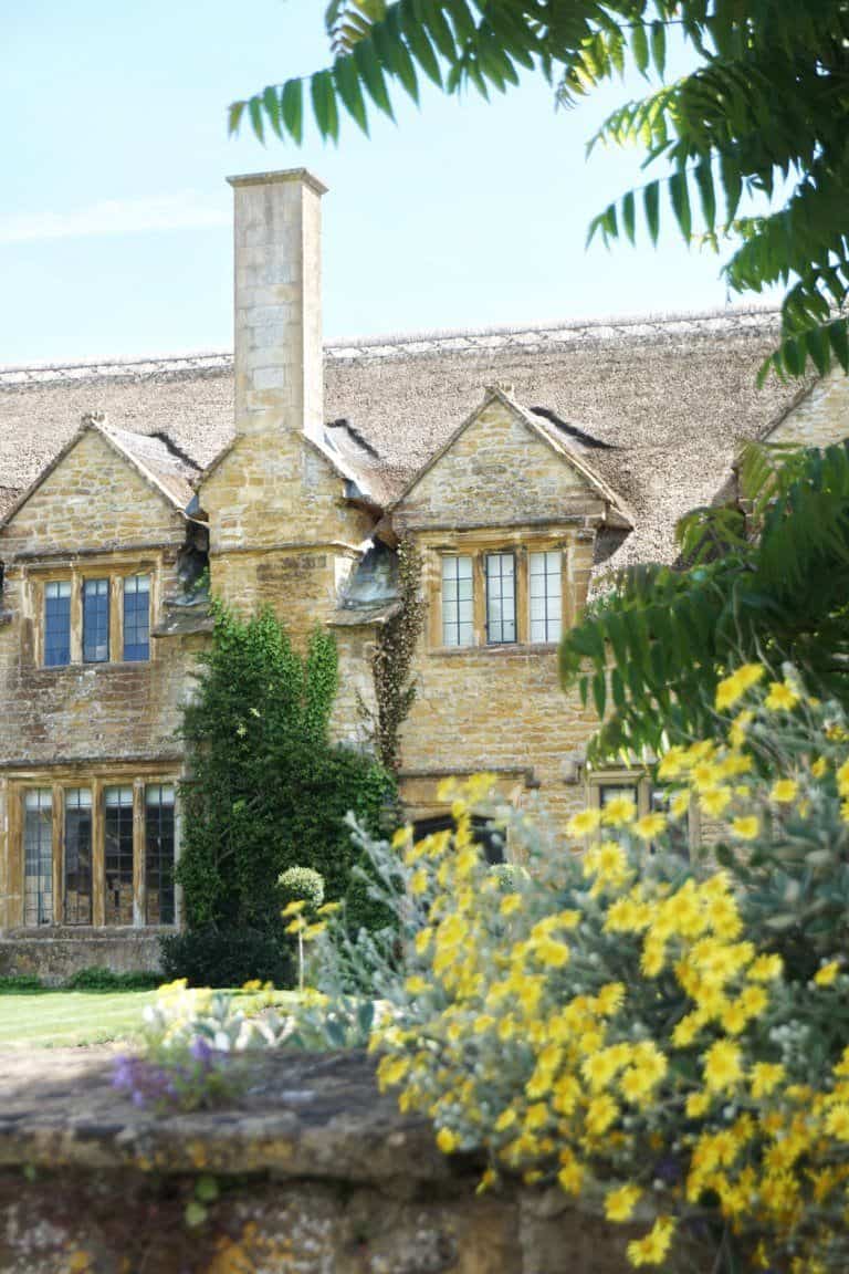 Lovely Flowers framing a stone house Hinton St George, Somerset, England (things to see, do and visit)