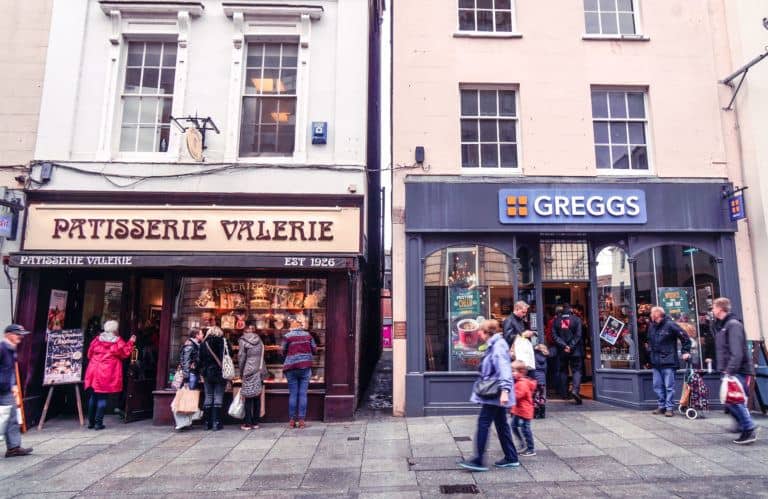 Walking down parliament street in Exeter, Devon, England: thought by many to be the narrowest street in the world