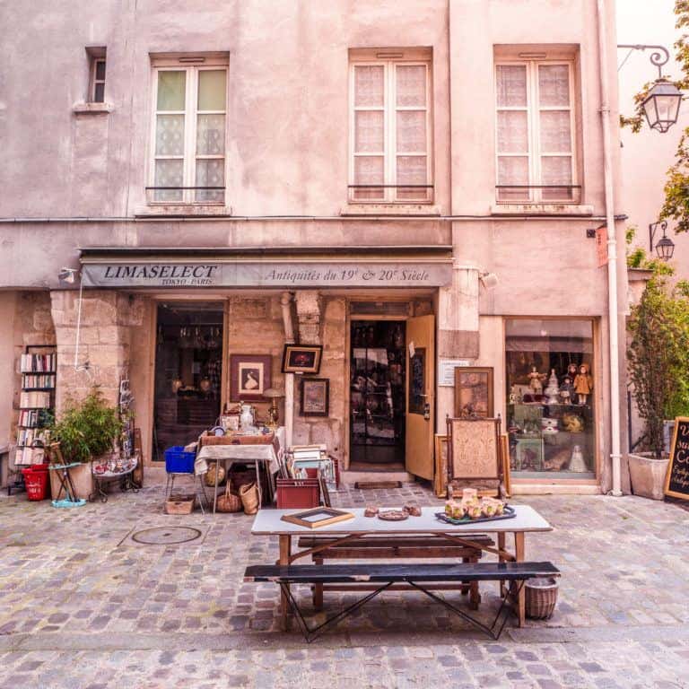 France Travel: Village St Paul: Somewhere between the Seine and Place des Vosges you'll find it. A little village that might be anywhere in France, tucked away in the unlikeliest of places. All vintage stores and cobbled lanes, this is Village St Paul, Paris' very own antique market in the heart of Le Marais...