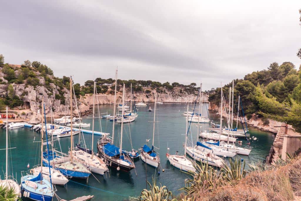 Adventure in Provence, Southern France: hiking the calanques de Cassis in a National Park: boats on the water