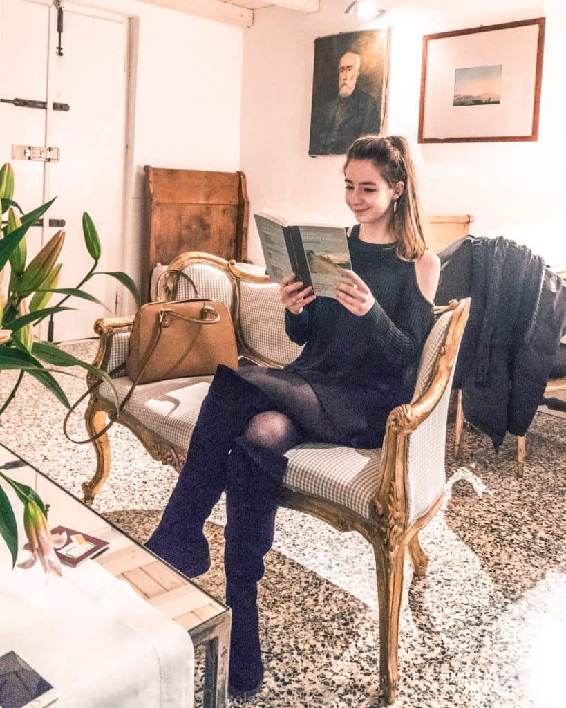 Reading in the duplex suite of Galleria Arnaboldi, Pavia, Italy