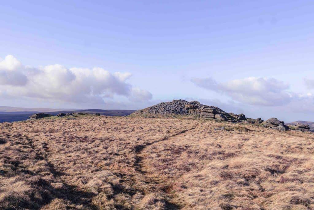 Hiking Rippon Tor, near Haytor, Dartmoor Walks, Devon, England: cairn on dartmoor