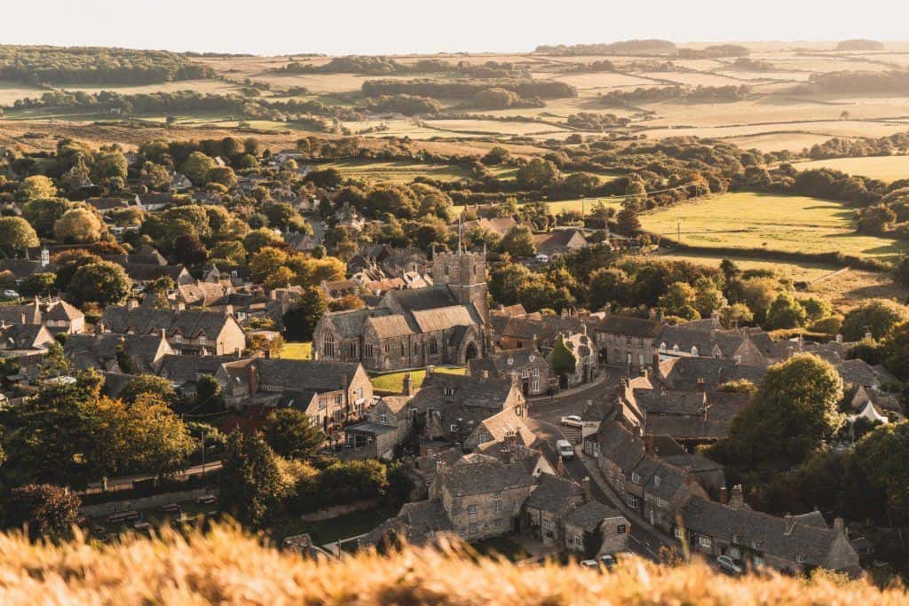 How to See Corfe Castle at Sunset, the Norman Fairytale Castle of Dorset, England