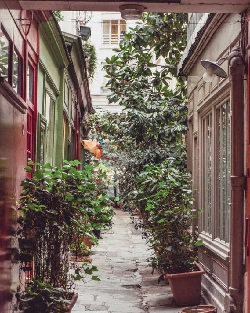 Welcome to the oldest umbrella repair shop in Paris! You'll know when you're in the right place when you reach a slightly ajar door. All blue paint and Haussmannian in design, it looks a little private. Read more on the blog, solosophie.com #obscureparis #solosophie