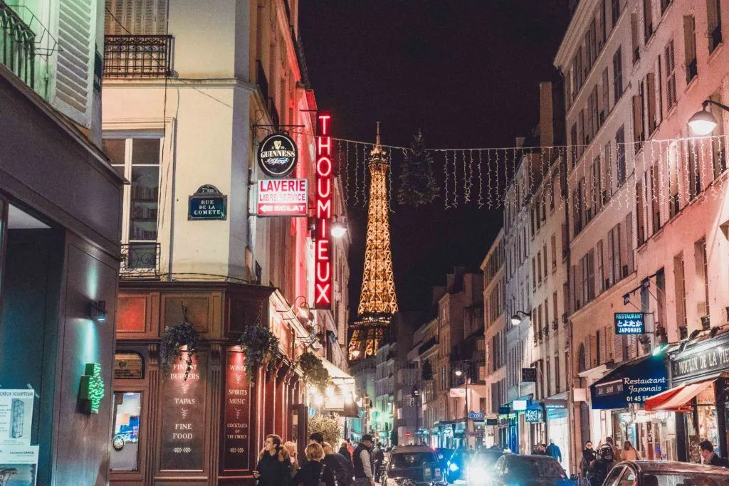 Paris in the evening: The glittering Eiffel Tower by night in France
