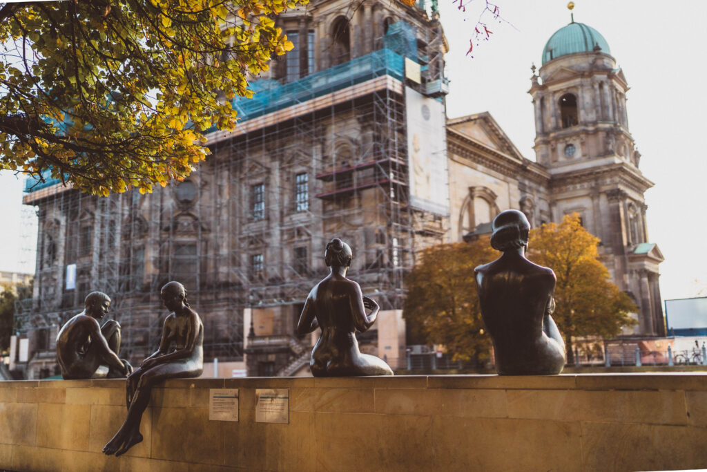 Three Girls One Boy statues 