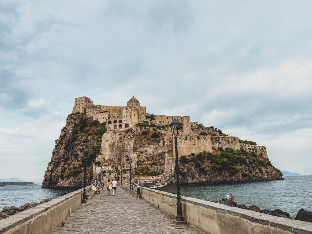 view of castello argonese and the walk way up ischia italy