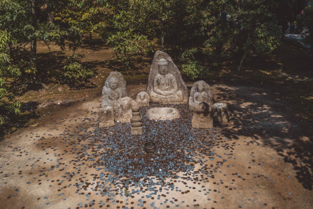 buddha statue coins