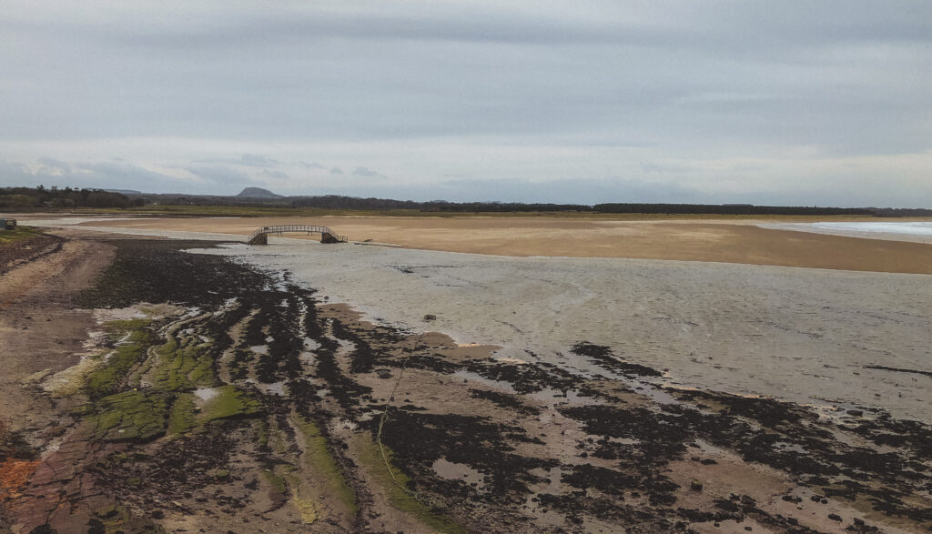 view of bridge to nowhere from afar in dunbar scotland 