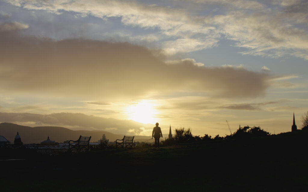 silhouette of a figure edinburgh landscape