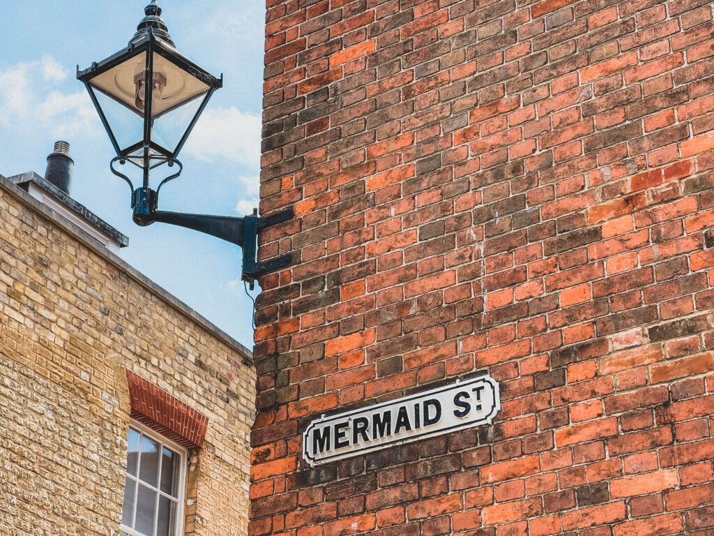 mermaid street sign