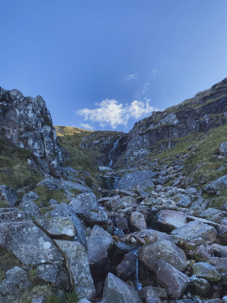 water streaming from slop of Ben Nevis, ascent up and the halfway point of the climb