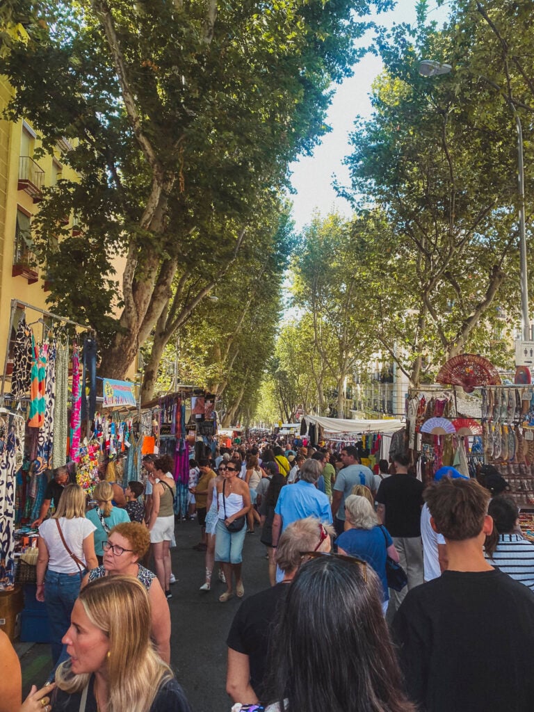 crowds gathering at El Rastro market Madrid