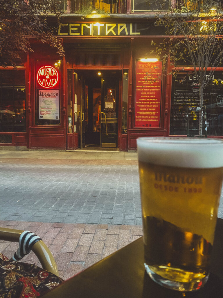 enjoying a beer at cafe central in Madrid