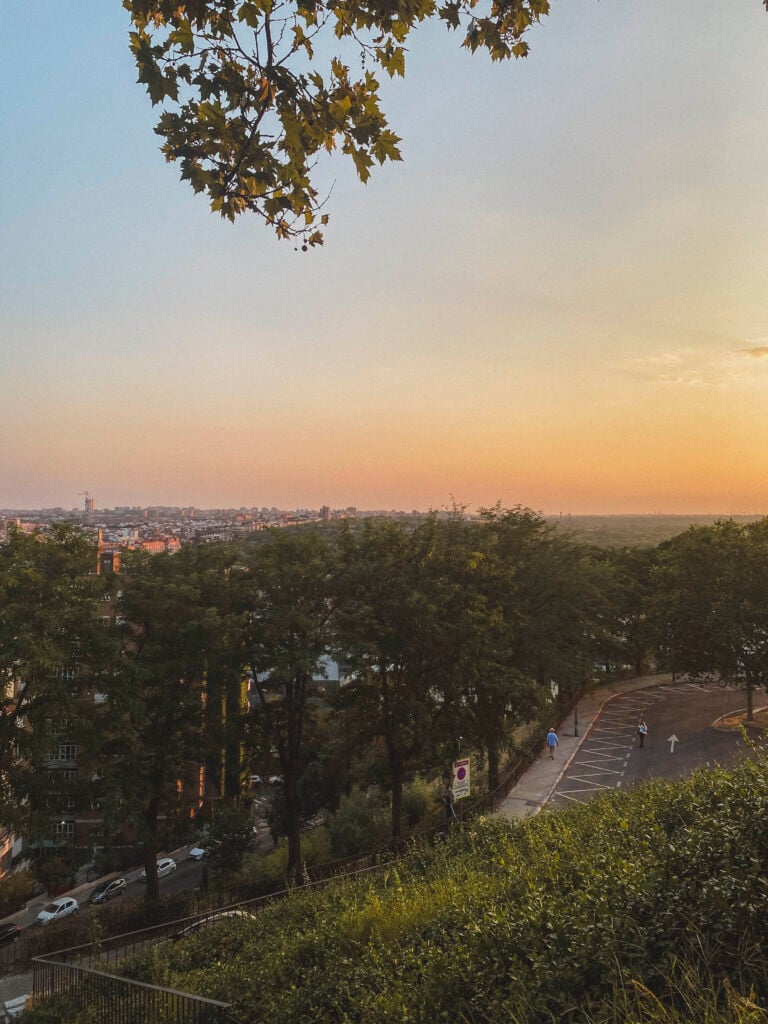 sun setting over Madrid from the Temple Debod viewpoint